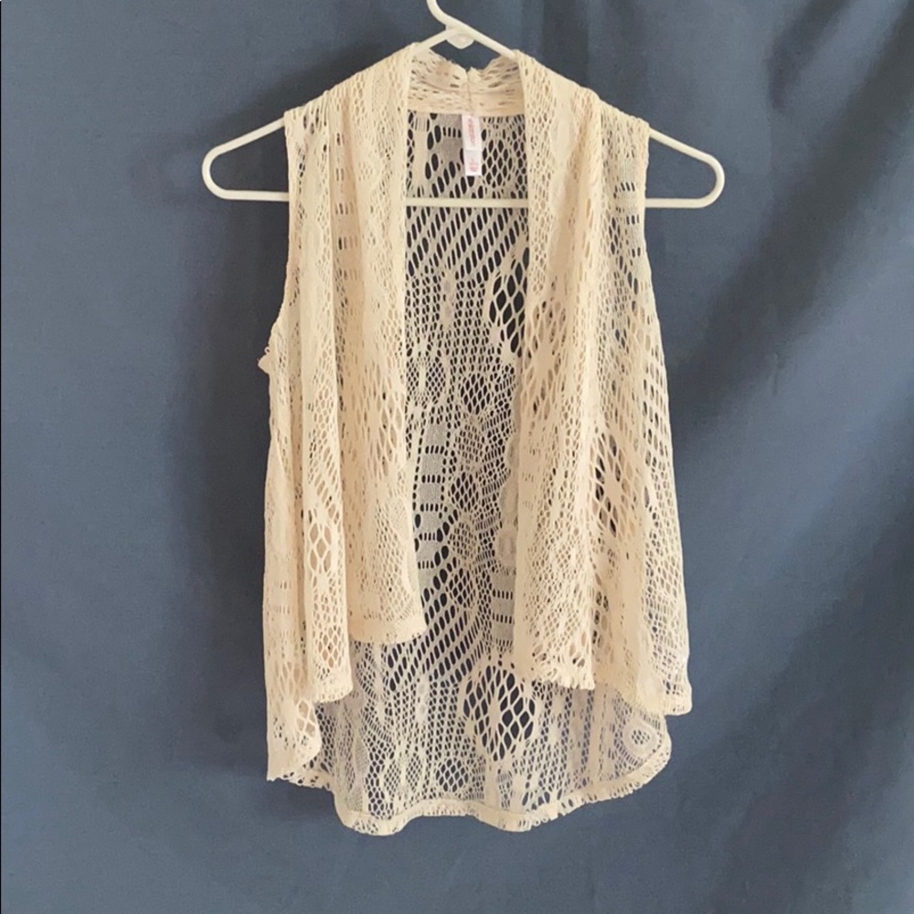 Creme colored sweater vest